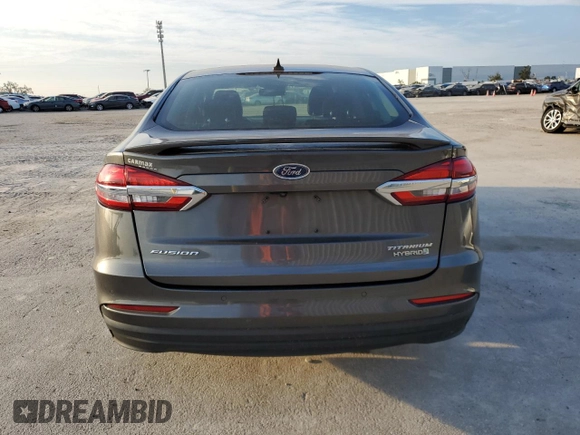 2019 Ford Fusion Hybrid Titanium with VIN 3FA6P0RU9KR116785, listed as a Copart auction lot 68052202 with 89,486 mi miles. Bid and sale history available at carsss.com. Image 6.