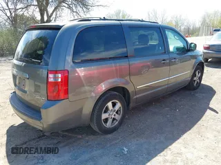 2010 Dodge Grand Caravan SXT with VIN 2D4RN5D1XAR293862, listed as a IAAI auction lot 42179737 with 324,144 mi miles and . Bid and sale history available at DreamBid. Image 4.