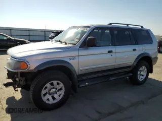 2002 Mitsubishi Montero z VIN JA4LS31R72J027368, wystawiony jako Copart lot #66519624 z przebiegiem 166 381 mil mil oraz Szkoda całkowita • Salvage title. Historia ofert i sprzedaży dostępna na DreamBid. Obrazek 1.