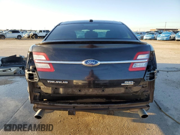 2014 Ford Taurus SEL with VIN 1FAHP2E89EG127293, listed as a Copart auction lot 48139185 with 144,245 mi miles and Clean Title. Bid and sale history available at carsss.com. Image 6.