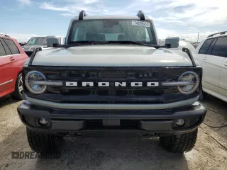 2021 Ford Bronco z VIN 1FMDE5CP4MLA65927, wystawiony jako Copart lot #74809974 z przebiegiem 41 296 mil mil oraz Nie do naprawy • Non repairable. Historia ofert i sprzedaży dostępna na DreamBid. Obrazek 5.