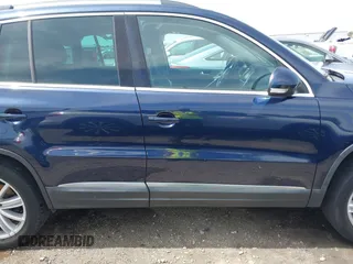 2012 Volkswagen Tiguan S with VIN WVGBV7AX3CW571039, listed as a IAAI auction lot 41928361 with 165,938 mi miles and . Bid and sale history available at DreamBid. Image 13.