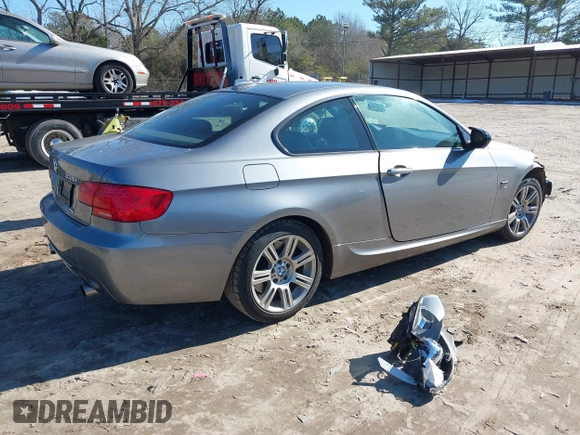 2012 BMW 3 Series 335i xDrive with VIN WBAKF9C5XCE620684, listed as a IAAI auction lot 41341828 with 154,809 mi miles. Bid and sale history available at carsss.com. Image 4.