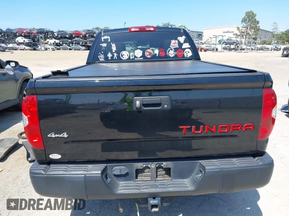 2019 Toyota Tundra SR with VIN 5TFUY5F13KX852912, listed as a IAAI auction lot 42327399 with 124,193 mi miles and . Bid and sale history available at DreamBid. Image 16.