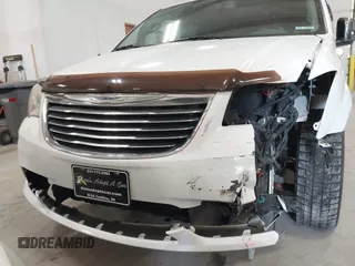 2014 Chrysler Town & Country Limited with VIN 2C4RC1GG7ER178802, listed as a IAAI auction lot 41863918 with 103,777 mi miles and . Bid and sale history available at DreamBid. Image 19.