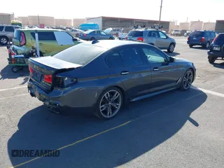 2018 BMW 5 Series M550i xDrive with VIN WBAJB9C51JB049513, listed as a IAAI auction lot 41146990 with 51,218 mi miles. Bid and sale history available at carsss.com. Image 4.