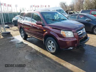 2007 Honda Pilot EX-L with VIN 5FNYF18647B004936, listed as a IAAI auction lot 41656465 with 225,580 mi miles and . Bid and sale history available at carsss.com. Image 1.