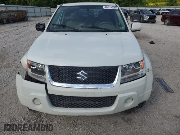 2010 Suzuki Grand Vitara Premium z VIN JS3TD0D24A4100983, wystawiony jako Copart lot #60311295 z przebiegiem 104 455 mil mil oraz Szkoda całkowita • Salvage title. Historia ofert i sprzedaży dostępna na DreamBid. Obrazek 5.