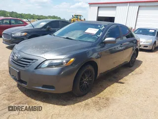 2009 Toyota Camry with VIN 4T1BE46K19U822477, listed as a IAAI auction lot 42052700 with 218,509 mi miles. Bid and sale history available at carsss.com. Image 2.