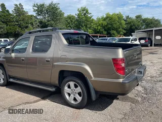 2009 Honda Ridgeline RTL with VIN 2HJYK16539H500759, listed as a Copart auction lot 63874225 with 123,508 mi miles and Clean title. Bid and sale history available at DreamBid. Image 3.
