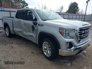 2020 GMC Sierra 1500 SLT z VIN 3GTU9DED9LG299417, wystawiony jako IAAI lot #41554567 z przebiegiem 66 683 mil mil oraz . Historia ofert i sprzedaży dostępna na DreamBid. Obrazek 1.