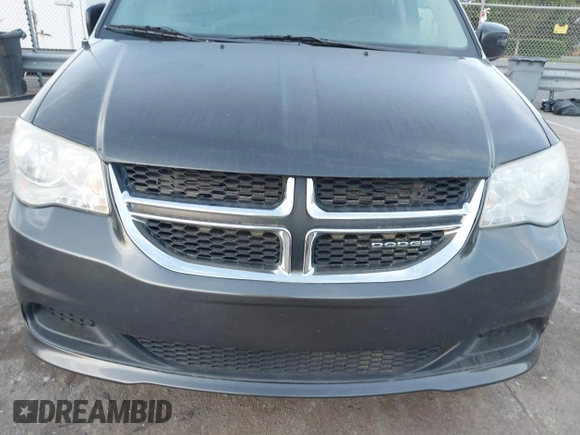 2012 Dodge Grand Caravan SXT with VIN 2C4RDGCG1CR141019, listed as a IAAI auction lot 42088541 with 148,931 mi miles and . Bid and sale history available at DreamBid. Image 6.