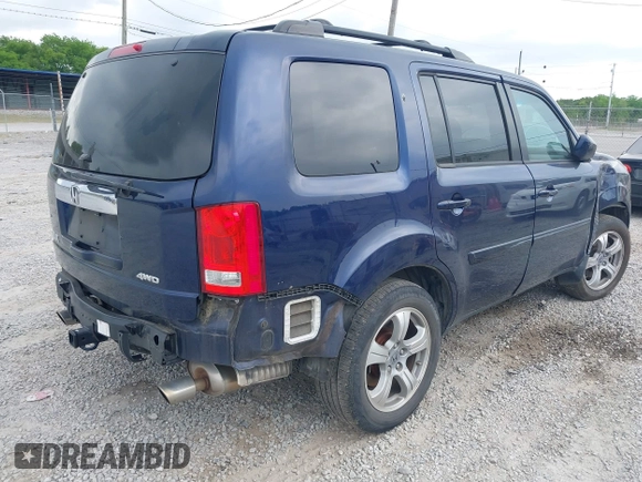 2015 Honda Pilot EX-L with VIN 5FNYF4H56FB040909, listed as a IAAI auction lot 42028609 with 267,375 mi miles and . Bid and sale history available at carsss.com. Image 4.