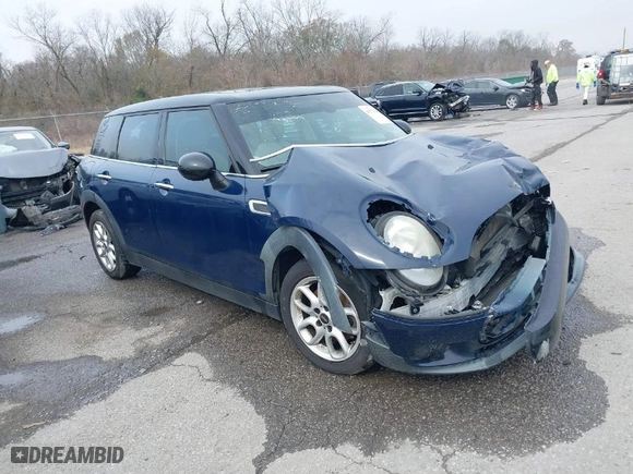 2016 MINI Cooper Clubman with VIN WMWLN5C54G2E30843, listed as a IAAI auction lot 41371368 with 1 mi miles. Bid and sale history available at carsss.com. Image 1.