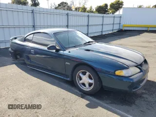 1997 Ford Mustang GT with VIN 1FALP42X0VF181072, listed as a Copart auction lot 49300975 with 193,570 mi miles and Clean title. Bid and sale history available at DreamBid. Image 4.