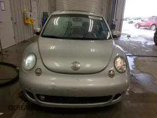 2004 Volkswagen New Beetle Coupe Turbo S with VIN 3VWFE31C54M402831, listed as a Copart auction lot 77426094 with 155,245 mi miles and Clean Title. Bid and sale history available at carsss.com. Image 5.