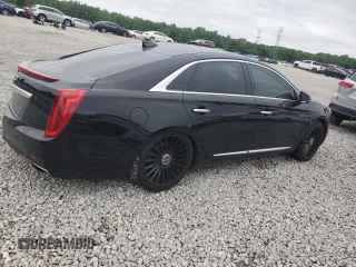 2017 Cadillac XTS Luxury z VIN 2G61M5S34H9199779, wystawiony jako Copart lot #54131845 z przebiegiem 110 571 mil mil oraz Szkoda całkowita • Salvage title. Historia ofert i sprzedaży dostępna na DreamBid. Obrazek 3.