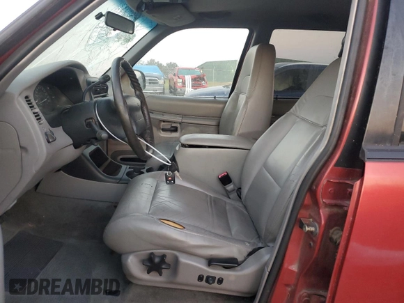 2000 Ford Explorer with VIN 1FMZU63X3YUB63135, listed as a Copart auction lot 75742324 with 168,191 mi miles and Salvage title. Bid and sale history available at DreamBid. Image 7.