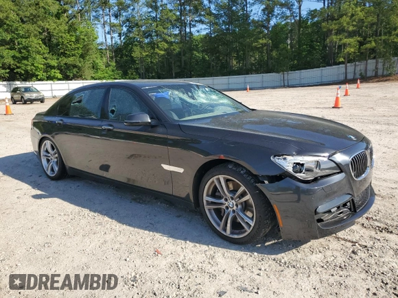 2013 BMW 7 Series 750Li xDrive with VIN WBAYF8C57DD140694, listed as a Copart auction lot 56983435 with 113,444 mi miles and Salvage title. Bid and sale history available at DreamBid. Image 4.