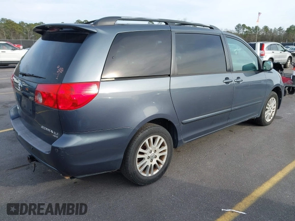 2009 Toyota Sienna XLE with VIN 5TDBK22C79S026370, listed as a IAAI auction lot 41471005 with 200,720 mi miles and . Bid and sale history available at DreamBid. Image 4.