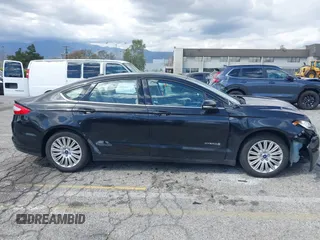 2015 Ford Fusion SE Hybrid with VIN 3FA6P0LU7FR199065, listed as a IAAI auction lot 41944181 with 197,020 mi miles. Bid and sale history available at carsss.com. Image 13.