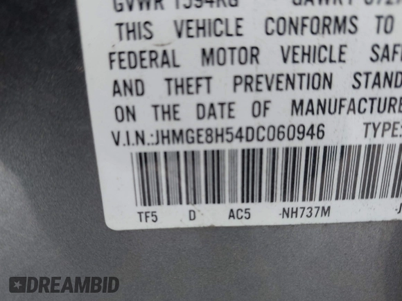 2013 Honda Fit Sport with VIN JHMGE8H54DC060946, listed as a IAAI auction lot 42095655 with 117,729 mi miles. Bid and sale history available at carsss.com. Image 9.