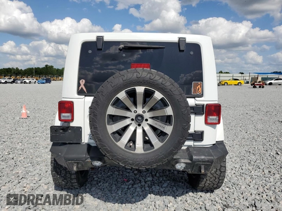 2016 Jeep Wrangler Unlimited Rubicon with VIN 1C4BJWFG9GL103312, listed as a Copart auction lot 52559465 with 79,692 mi miles and Salvage Title. Bid and sale history available at carsss.com. Image 6.