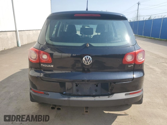 2011 Volkswagen Tiguan with VIN WVGCV7AX8BW511387, listed as a Copart auction lot 57284625 with 284,102 mi miles and Salvage title. Bid and sale history available at DreamBid. Image 6.