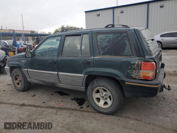 1993 Jeep Grand Cherokee Laredo with VIN 1J4GZ58S7PC125040, listed as a Copart auction lot 78846954 with 149,531 mi miles and Salvage Title. Bid and sale history available at carsss.com. Image 2.