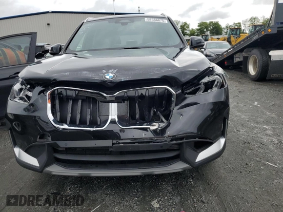 2023 BMW X1 xDrive28i with VIN WBX73EF09P5W64467, listed as a Copart auction lot 58586875 with 29,022 mi miles and Salvage title. Bid and sale history available at DreamBid. Image 5.