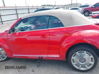 2015 Volkswagen Beetle 1.8T w/Tech with VIN 3VW517AT4FM803238, listed as a IAAI auction lot 41812373 with 42,369 mi miles and . Bid and sale history available at DreamBid. Image 14.