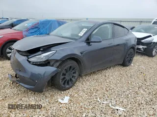 2022 Tesla Model Y Long Range z VIN 7SAYGAEE4NF543503, wystawiony jako Copart lot #47143155 z przebiegiem 53 874 mil mil oraz Szkody całkowita. Historia ofert i sprzedaży dostępna na DreamBid. Obrazek 1.