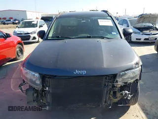 2015 Jeep Compass Sport with VIN 1C4NJCBBXFD274472, listed as a IAAI auction lot 41629585 with 124,407 mi miles. Bid and sale history available at carsss.com. Image 13.