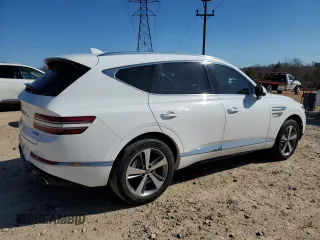 2023 Genesis GV80 z VIN KMUHCESC7PU147303, wystawiony jako Copart lot #48318015 z przebiegiem 24 954 mil mil oraz Szkody całkowita. Historia ofert i sprzedaży dostępna na DreamBid. Obrazek 3.