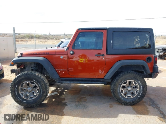 2014 Jeep Wrangler Rubicon with VIN 1C4BJWCG8EL185597, listed as a IAAI auction lot 41914489 with 85,545 mi miles and . Bid and sale history available at DreamBid. Image 14.