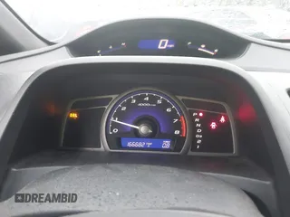 2006 Honda Civic LX with VIN 2HGFA16556H520894, listed as a IAAI auction lot 41963736 with 166,682 mi miles and . Bid and sale history available at DreamBid. Image 7.