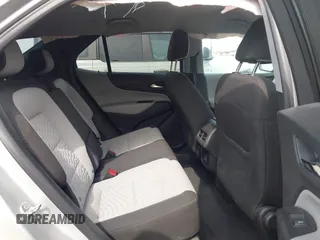 2021 Chevrolet Equinox LS z VIN 3GNAXHEV4MS134129, wystawiony jako IAAI lot #42031353 z przebiegiem 137 684 mil mil oraz . Historia ofert i sprzedaży dostępna na DreamBid. Obrazek 8.