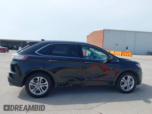 2015 Ford Edge Titanium z VIN 2FMTK3K87FBC06852, wystawiony jako IAAI lot #42335238 z przebiegiem 187 256 mil mil oraz . Historia ofert i sprzedaży dostępna na DreamBid. Obrazek 13.