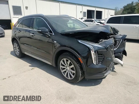 2021 Cadillac XT4 FWD Premium Luxury z VIN 1GYFZCR48MF002468, wystawiony jako Copart lot #50878955 z przebiegiem 76 034 mil mil oraz Szkoda całkowita • Salvage title. Historia ofert i sprzedaży dostępna na DreamBid. Obrazek 11.