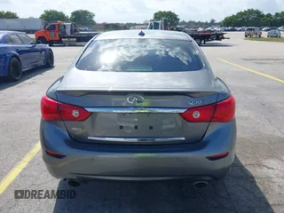2015 Infiniti Q50 Premium z VIN JN1BV7AR3FM390743, wystawiony jako IAAI lot #41990093 z przebiegiem 91 350 mil mil oraz . Historia ofert i sprzedaży dostępna na DreamBid. Obrazek 16.