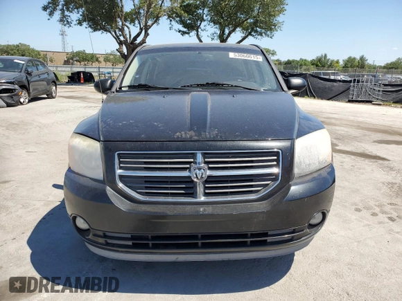 2011 Dodge Caliber Mainstreet with VIN 1B3CB3HA2BD205628, listed as a Copart auction lot 53060615 with 192,644 mi miles and Salvage Title. Bid and sale history available at carsss.com. Image 5.
