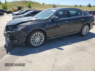 2015 Lincoln MKS with VIN 1LNHL9DK3FG601456, listed as a Copart auction lot 63227765 with 99,952 mi miles and Salvage title. Bid and sale history available at DreamBid. Image 1.