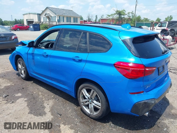 2021 BMW X1 xDrive28i with VIN WBXJG9C04M5T61811, listed as a IAAI auction lot 42509852 with 30,400 mi miles and . Bid and sale history available at DreamBid. Image 3.