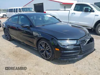 2016 Audi A7 Prestige with VIN WAU2MAFCXGN009402, listed as a IAAI auction lot 42682041 with 77,141 mi miles and . Bid and sale history available at DreamBid. Image 1.