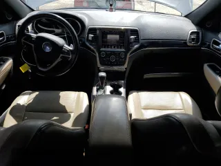 2016 Jeep Grand Cherokee Limited 75th Anniversary with VIN 1C4RJFBG2GC344181, listed as a Copart auction lot 53053525 with 138,726 mi miles and Salvage Title. Bid and sale history available at DreamBid. Image 8.