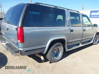 1994 GMC Suburban with VIN 1GKEC16K2RJ721119, listed as a IAAI auction lot 41075175 with 344,904 mi miles. Bid and sale history available at carsss.com. Image 4.