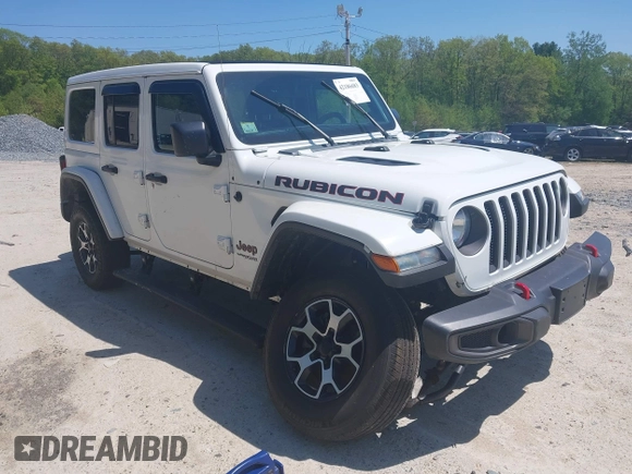 2021 Jeep Wrangler Unlimited Rubicon with VIN 1C4HJXFG5MW586842, listed as a IAAI auction lot 42186683 with 76,450 mi miles and . Bid and sale history available at DreamBid. Image 1.