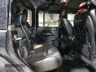 2021 Jeep Wrangler Unlimited Rubicon z VIN 1C4HJXFG7MW651772, wystawiony jako Copart lot #51651685 z przebiegiem 59 351 mil mil oraz Szkoda całkowita • Salvage title. Historia ofert i sprzedaży dostępna na DreamBid. Obrazek 11.