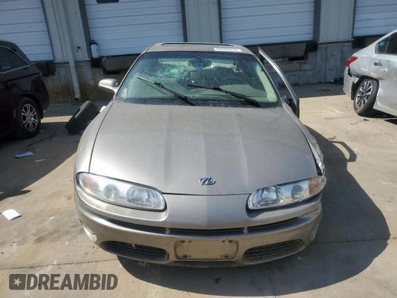 2002 Oldsmobile Aurora z VIN 1G3GR64H424238288, wystawiony jako Copart lot #68086014 z przebiegiem 97 232 mil mil oraz Szkody całkowita. Historia ofert i sprzedaży dostępna na DreamBid. Obrazek 5.