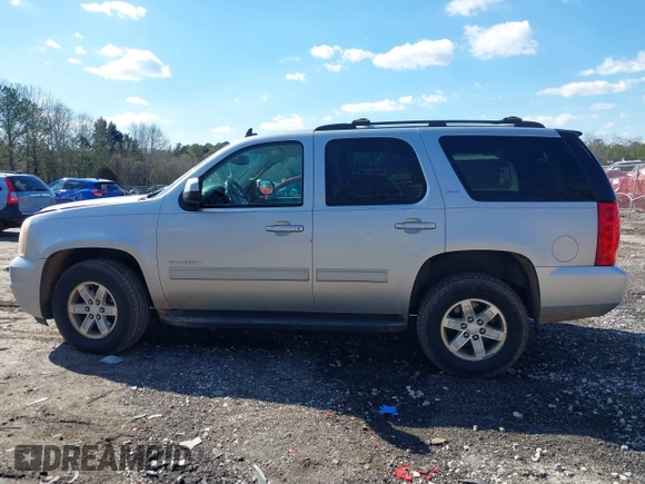 2012 GMC Yukon SLT with VIN 1GKS2CE02CR133683, listed as a IAAI auction lot 41375435 with 197,634 mi miles. Bid and sale history available at carsss.com. Image 14.